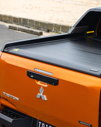 Ironman Electric Slide Away Roll Up Hard Cover for Mitsubishi MV Triton 2024+